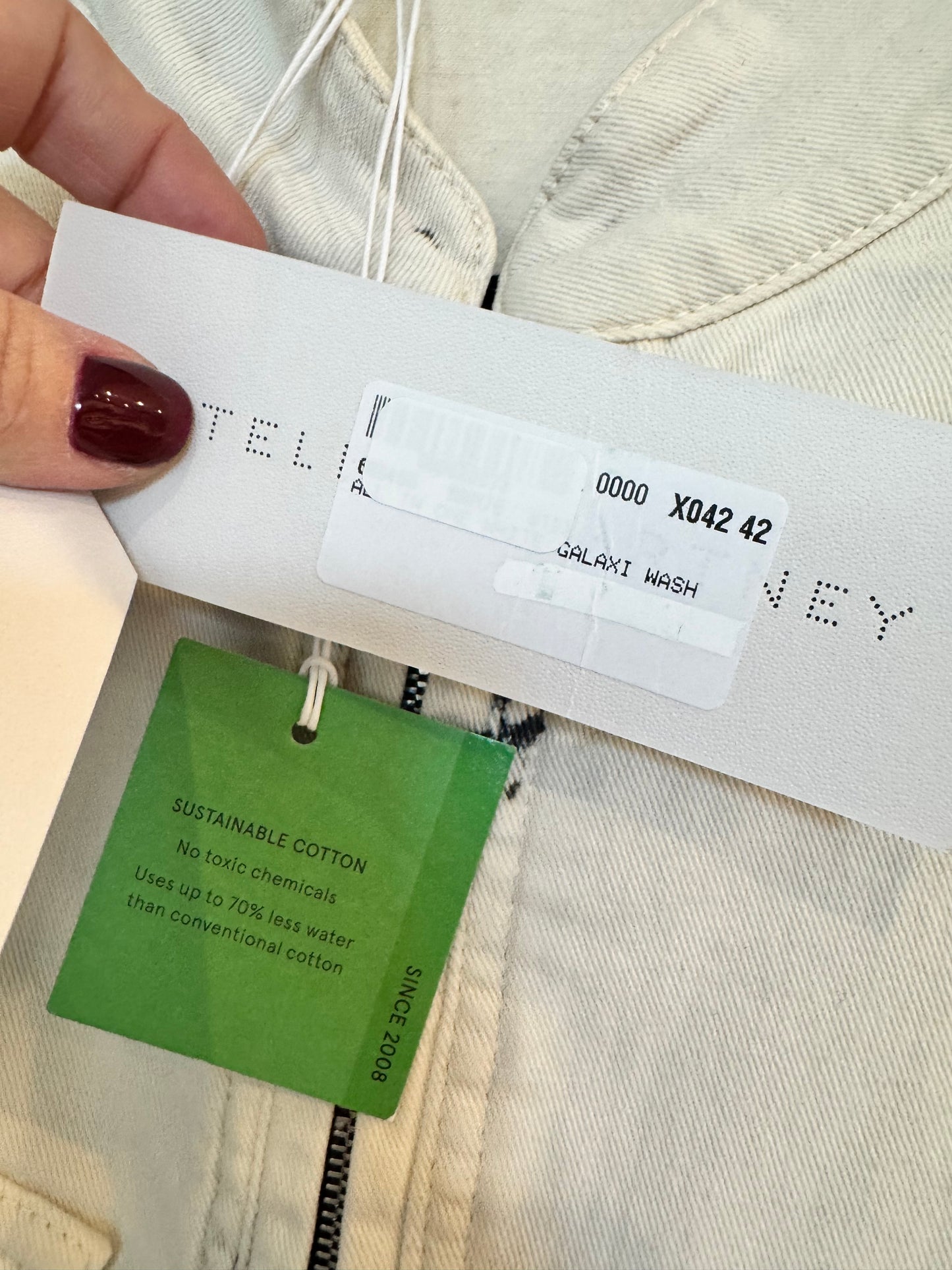 STELLA MCCARTNEY Zip-embellished acid-wash denim jumpsuit Size: 42 (New)