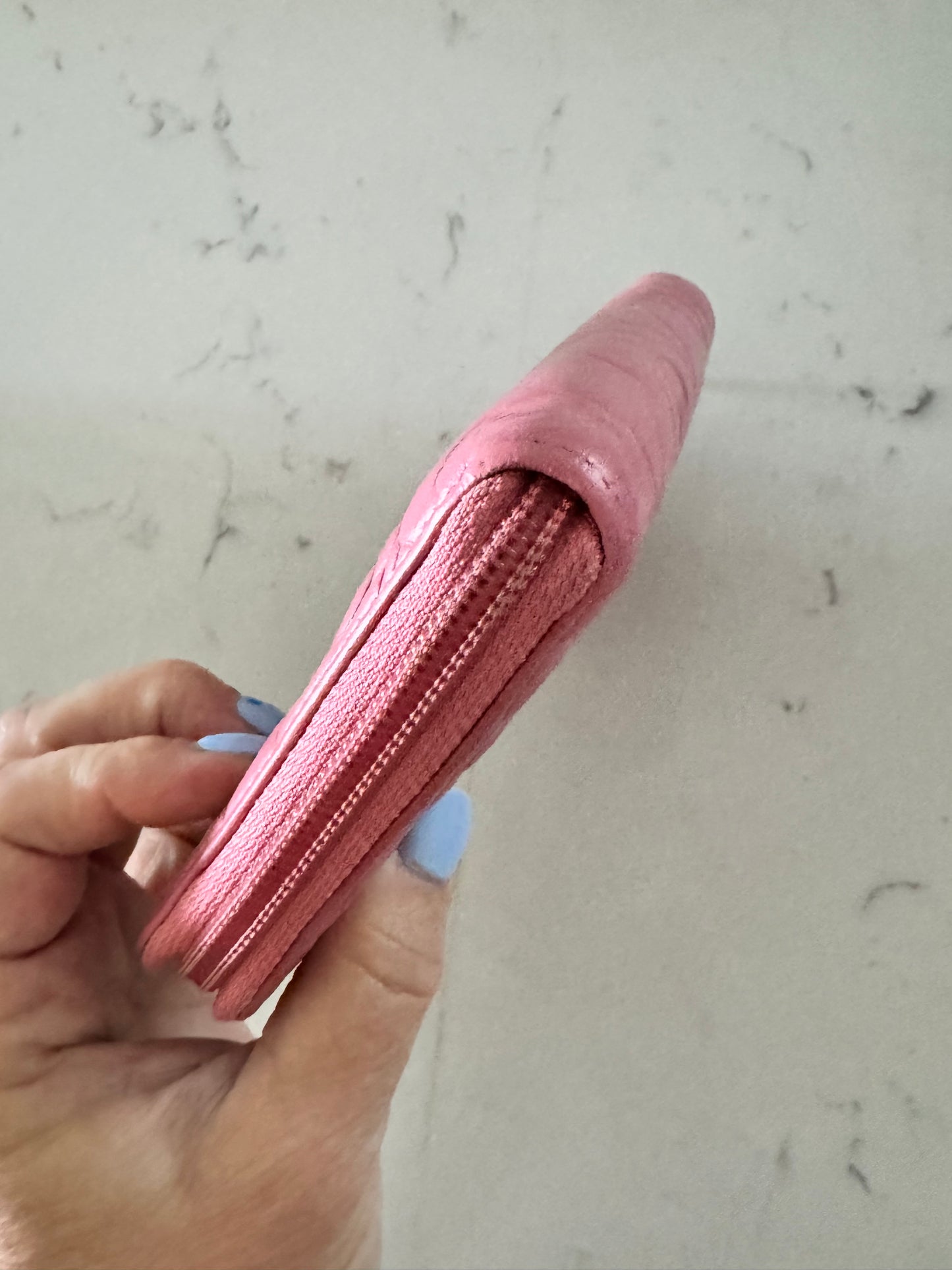 CHANEL Pink Lambskin Zip Around Camelia Wallet