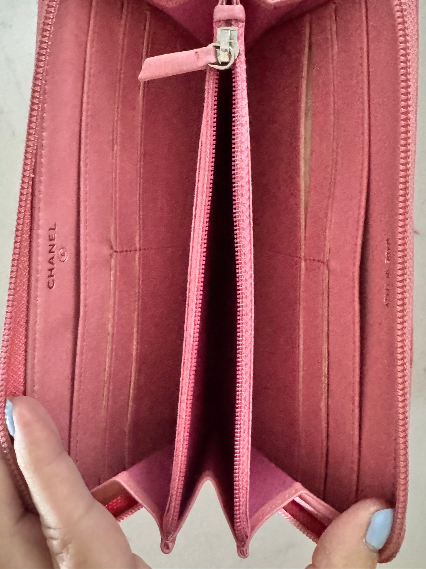 CHANEL Pink Lambskin Zip Around Camelia Wallet
