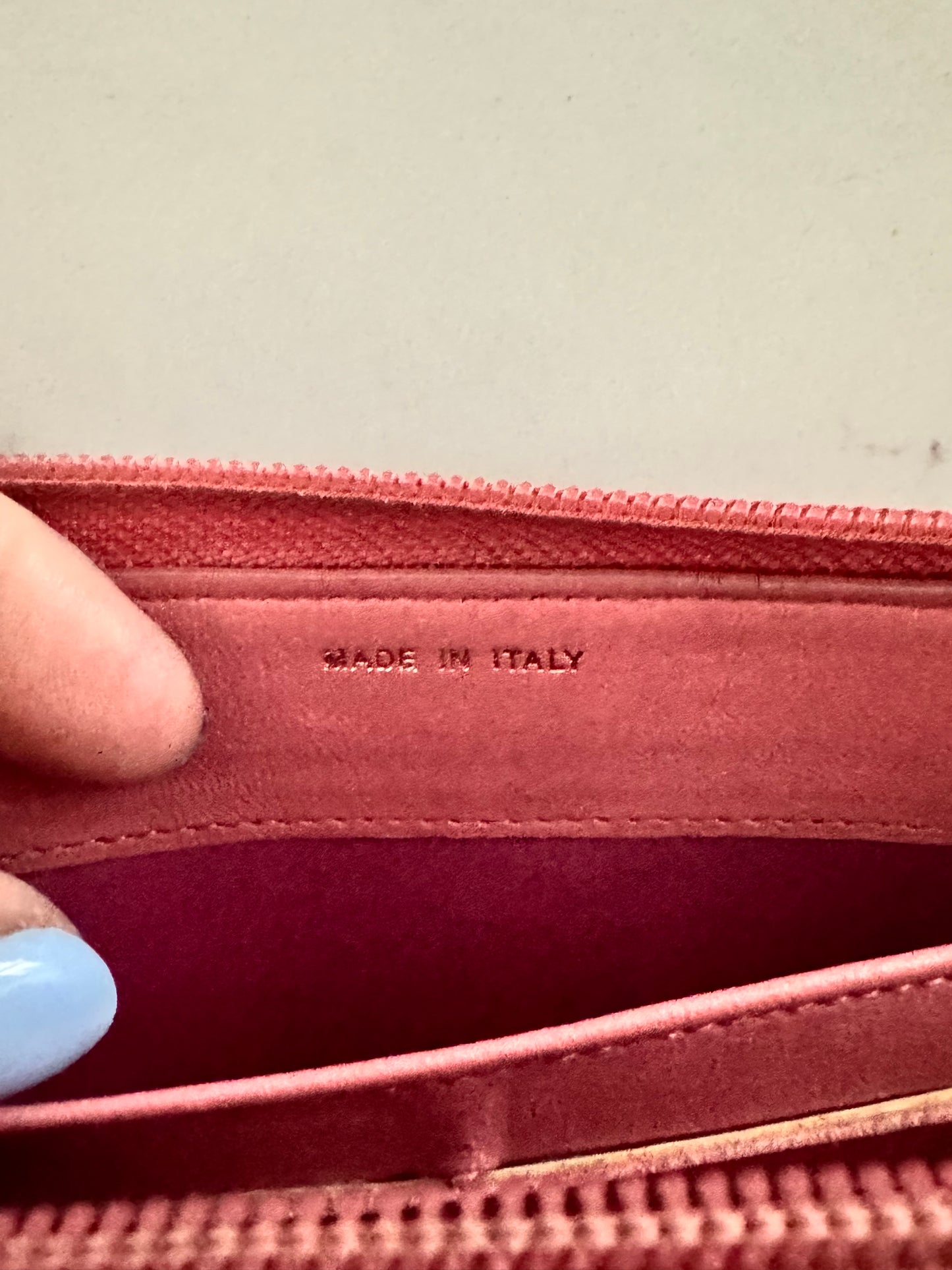 CHANEL Pink Lambskin Zip Around Camelia Wallet