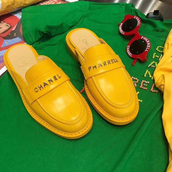 2019 Chanel "Pharrell" Jaune Leather Mules (Pre-Loved) Size: 7