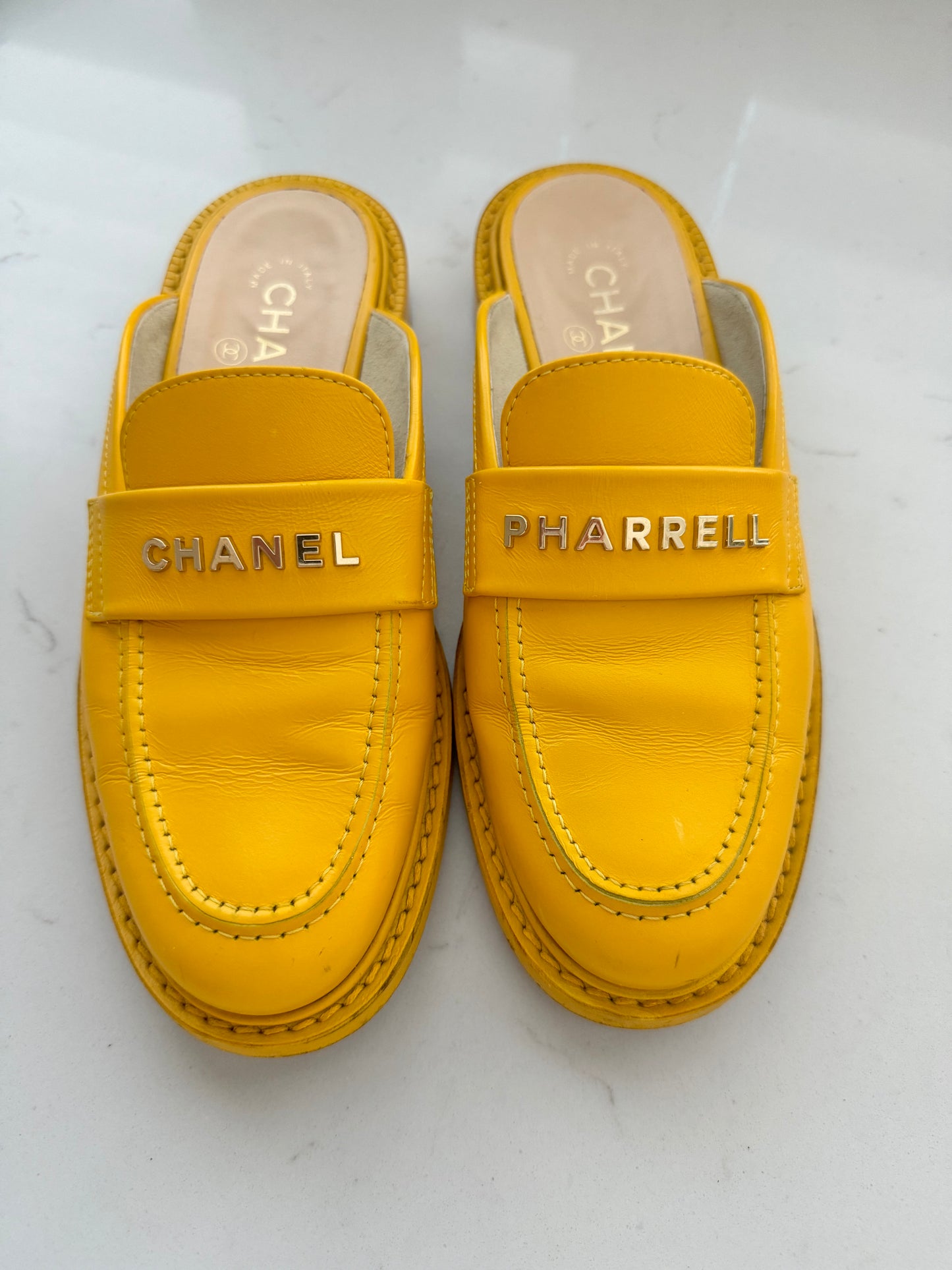 2019 Chanel "Pharrell" Jaune Leather Mules (Pre-Loved) Size: 7