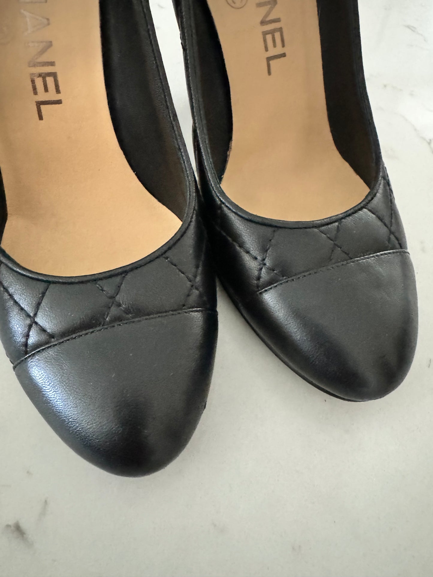 CHANEL Lambskin Quilted Black CC Cap Toe Pumps (Pre-Loved) Size: 35/US 5