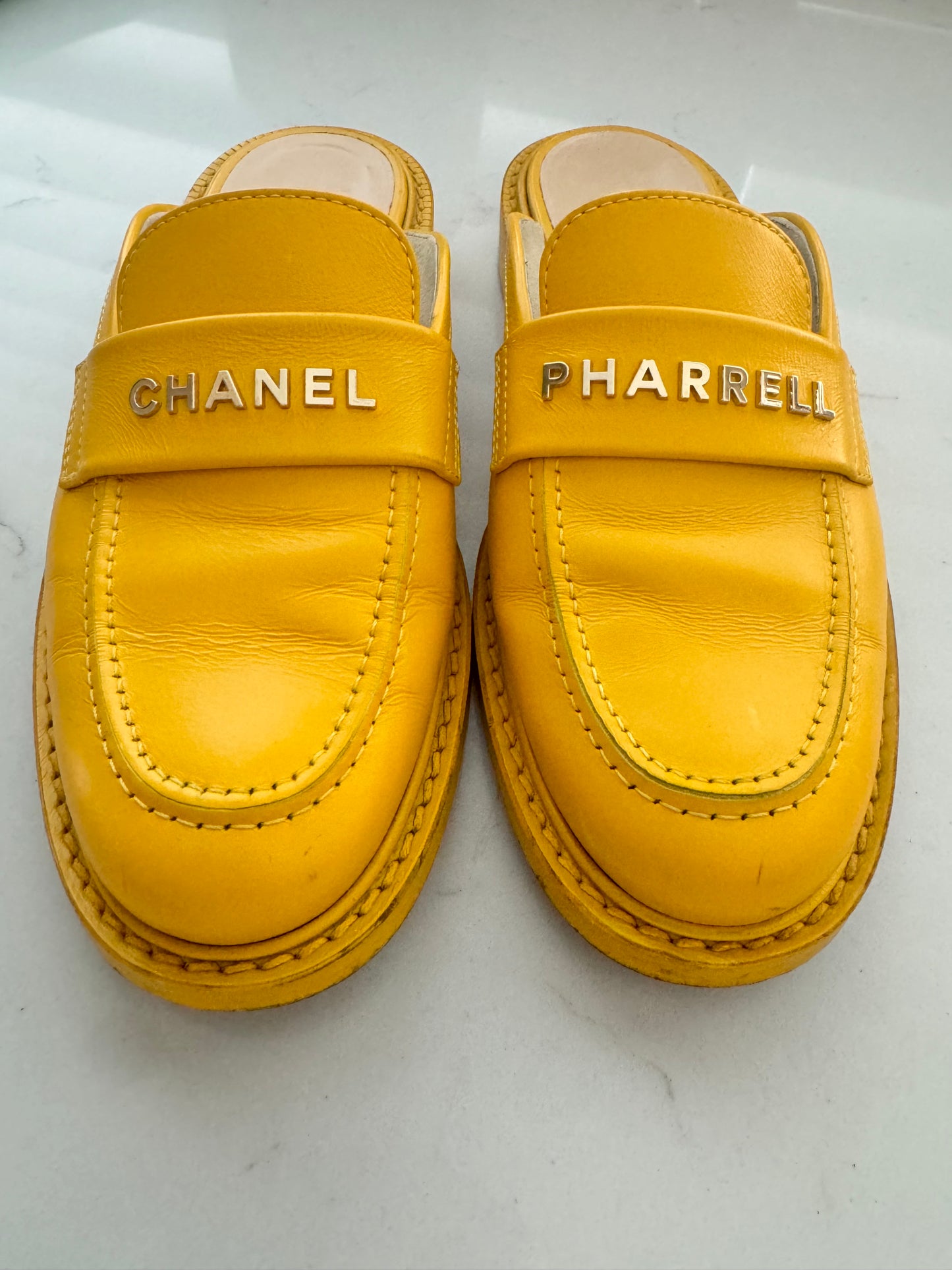 2019 Chanel "Pharrell" Jaune Leather Mules (Pre-Loved) Size: 7