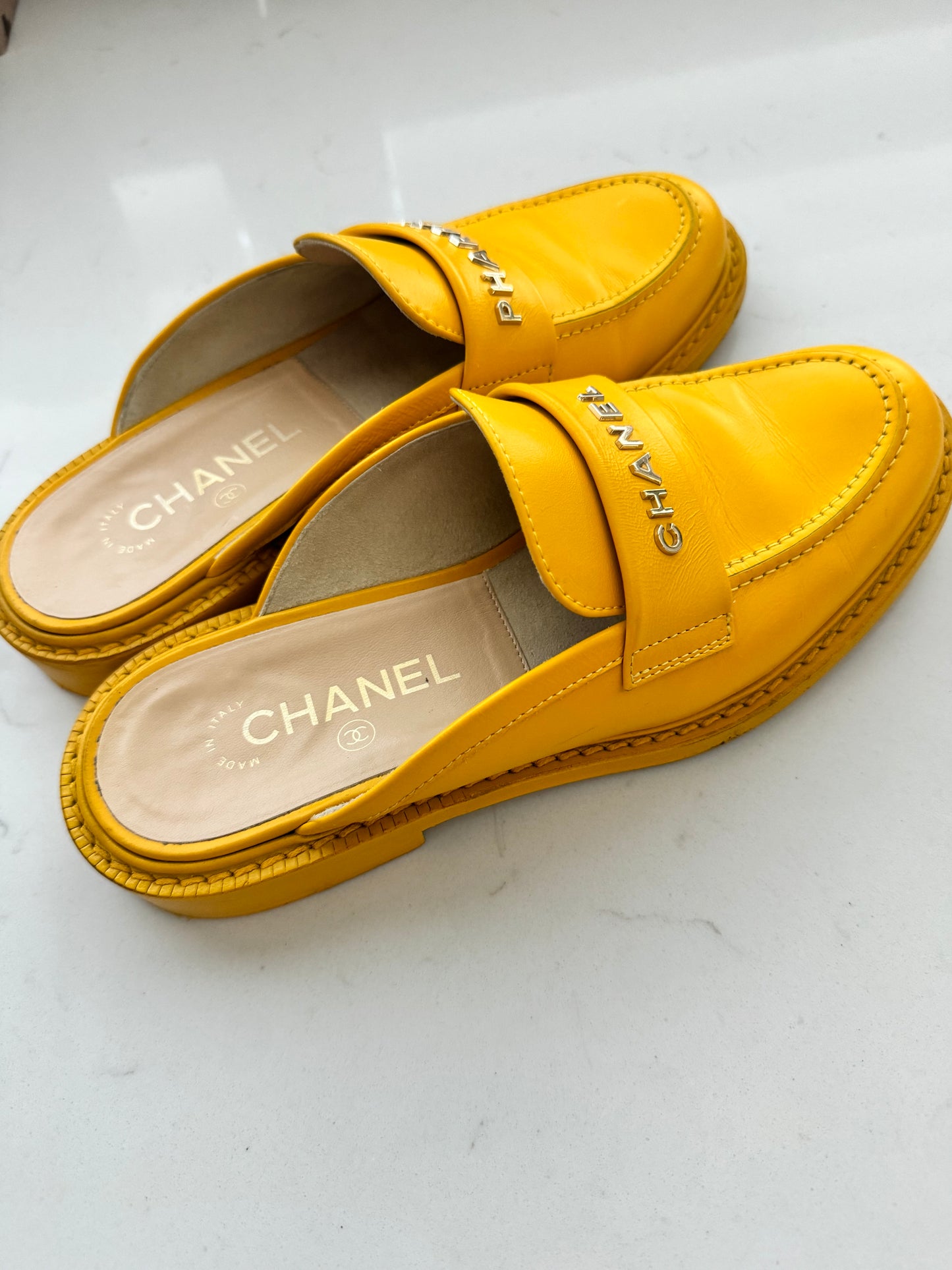 2019 Chanel "Pharrell" Jaune Leather Mules (Pre-Loved) Size: 7