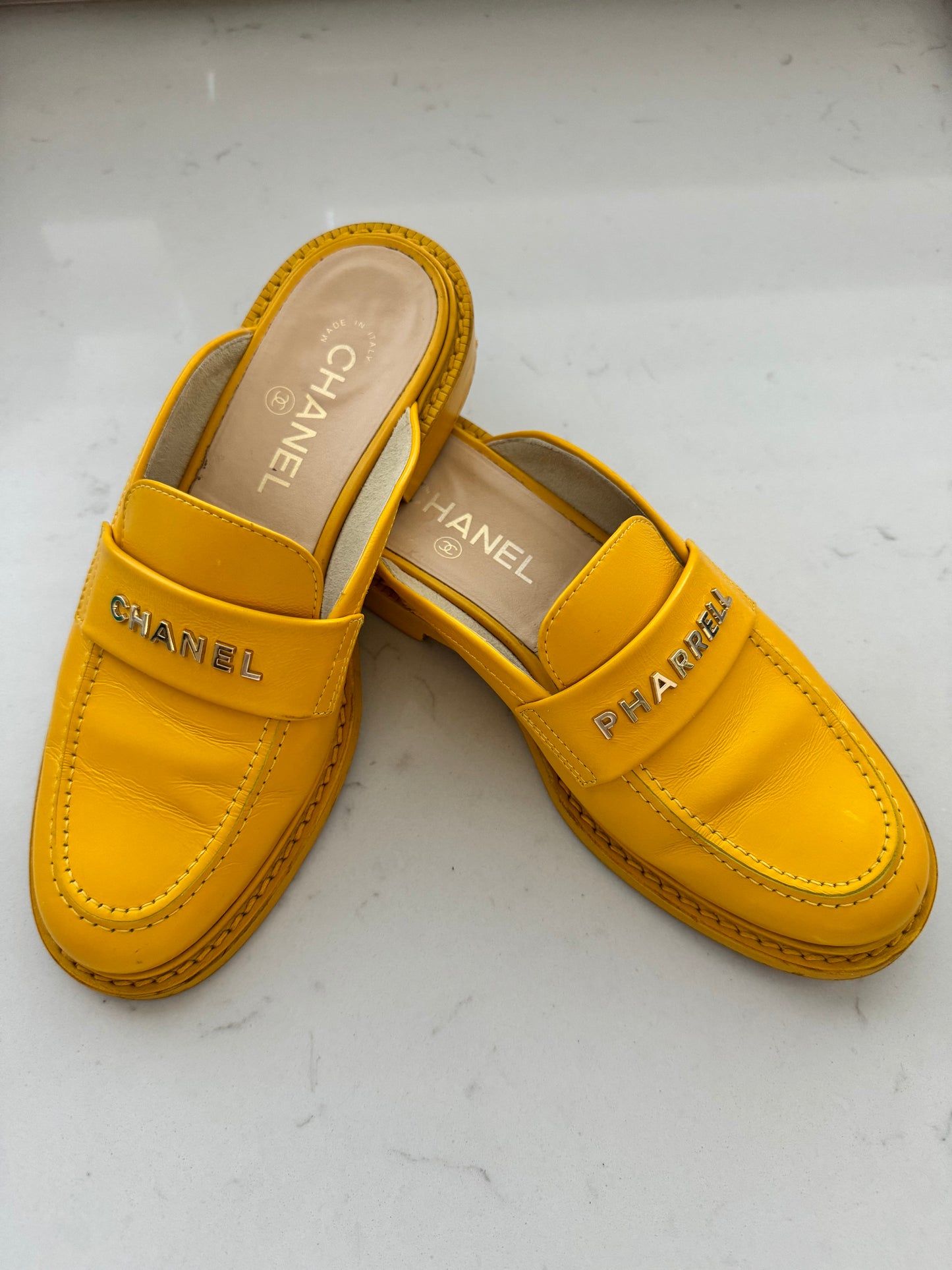 2019 Chanel "Pharrell" Jaune Leather Mules (Pre-Loved) Size: 7