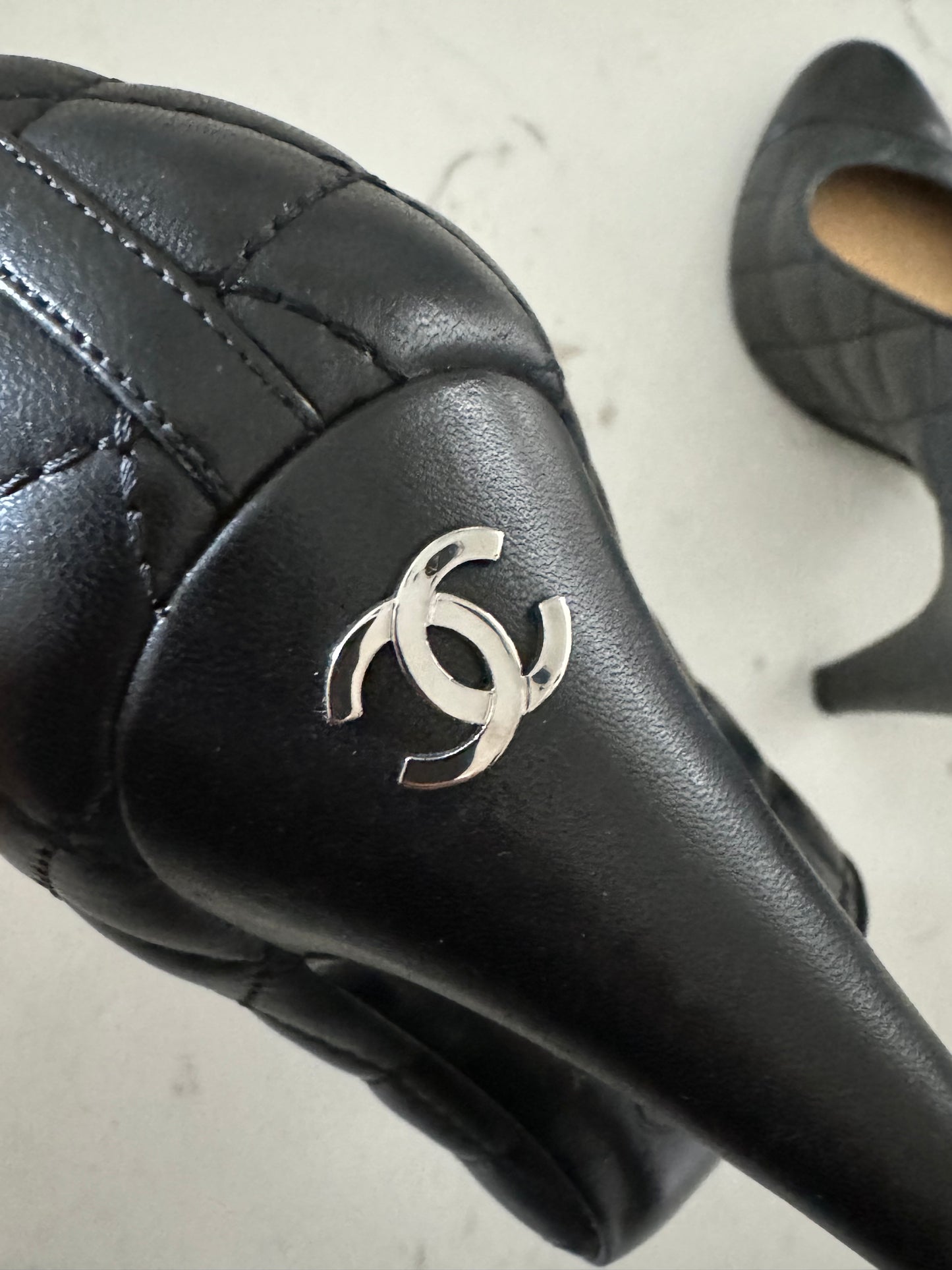 CHANEL Lambskin Quilted Black CC Cap Toe Pumps (Pre-Loved) Size: 35/US 5